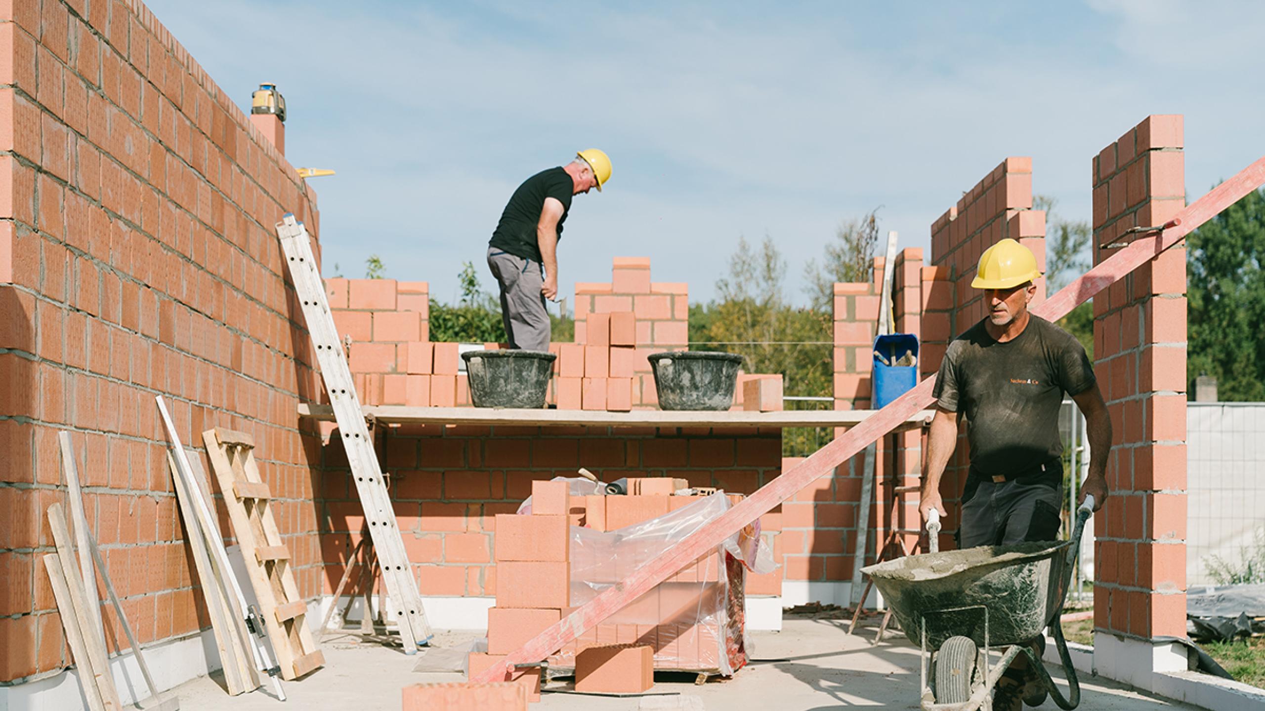 Arbeiders op bouwplaats